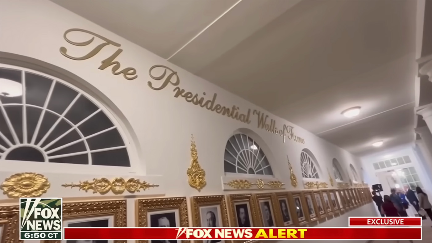 Interior hallway lined with ornate gold-framed presidential portraits and a large gilded script reading “The Presidential Walk of Fame” above arched windows.